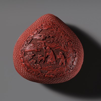 Lot 115 - A CINNABAR LACQUER PEACH-FORM BOX AND COVER DEPICTING SHOULAO, 18TH CENTURY