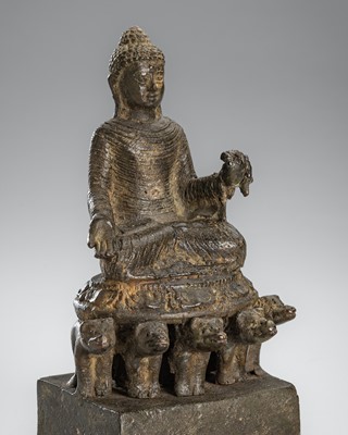 Lot 1297 - A BRONZE FIGURE OF BUDDHA ON THE THRONE OF LIONS, SWAT VALLEY, 8TH-10TH CENTURY