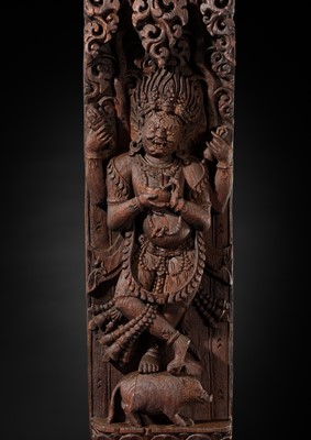 A WOOD STRUT DEPICTING THE FOUR-ARMED BHAIRAVA ATOP A BOAR, NEPAL, 17TH-18TH CENTURY