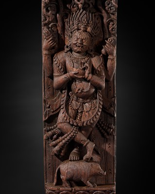 Lot 313 - A WOOD STRUT DEPICTING THE FOUR-ARMED BHAIRAVA ATOP A BOAR, NEPAL, 17TH-18TH CENTURY