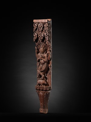 A WOOD STRUT DEPICTING THE FOUR-ARMED BHAIRAVA ATOP A BOAR, NEPAL, 17TH-18TH CENTURY