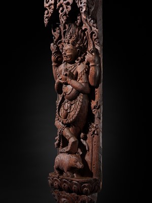 A WOOD STRUT DEPICTING THE FOUR-ARMED BHAIRAVA ATOP A BOAR, NEPAL, 17TH-18TH CENTURY