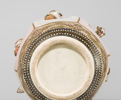 MAKUZU KOZAN: A GROUP OF FOUR LARGE MOLDED, GILT-DECORATED AND ENAMELED EARTHENWARE VASES WITH FROLICKING ANIMALS