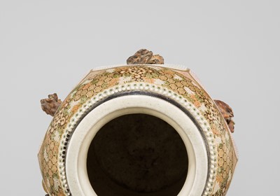 MAKUZU KOZAN: A GROUP OF FOUR LARGE MOLDED, GILT-DECORATED AND ENAMELED EARTHENWARE VASES WITH FROLICKING ANIMALS