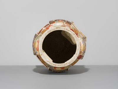 MAKUZU KOZAN: A GROUP OF FOUR LARGE MOLDED, GILT-DECORATED AND ENAMELED EARTHENWARE VASES WITH FROLICKING ANIMALS