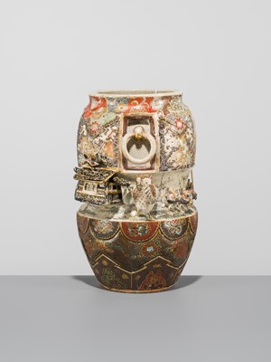 MAKUZU KOZAN: A GROUP OF FOUR LARGE MOLDED, GILT-DECORATED AND ENAMELED EARTHENWARE VASES WITH FROLICKING ANIMALS