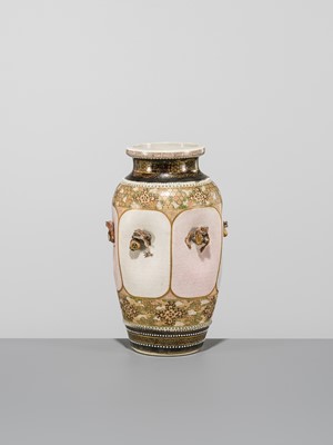 MAKUZU KOZAN: A GROUP OF FOUR LARGE MOLDED, GILT-DECORATED AND ENAMELED EARTHENWARE VASES WITH FROLICKING ANIMALS