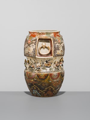 MAKUZU KOZAN: A GROUP OF FOUR LARGE MOLDED, GILT-DECORATED AND ENAMELED EARTHENWARE VASES WITH FROLICKING ANIMALS