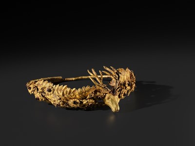 Lot 84 - A RARE GEMSTONE-SET GOLD WREATH WITH A STAG’S HEAD, HELLENISTIC PERIOD