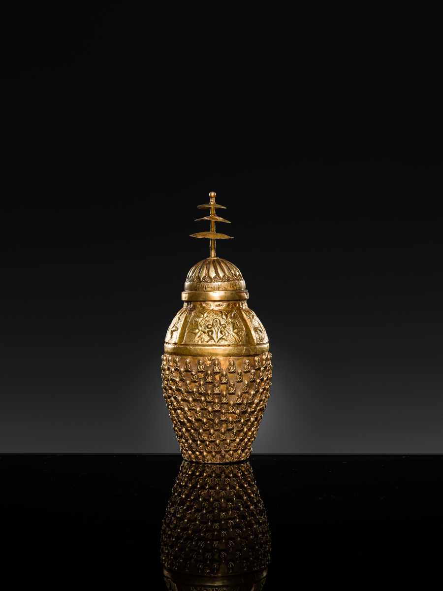 Lot 180 - AN EXTREMELY RARE GOLD REPOUSSÉ ‘THOUSAND