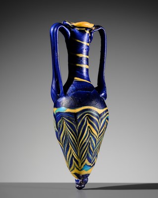 Lot 1472 - AN EASTERN MEDITERRANEAN CORE FORMED GLASS AMPHORISKOS, 2ND-1ST CENTURY BC