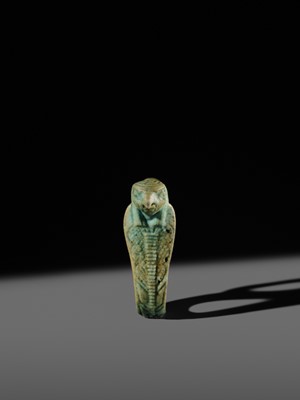 Lot 47 - A RARE URAEUS AMULET OF WADJET AND NEKHBET, TURQUOISE-BLUE FAIENCE, LATE PERIOD