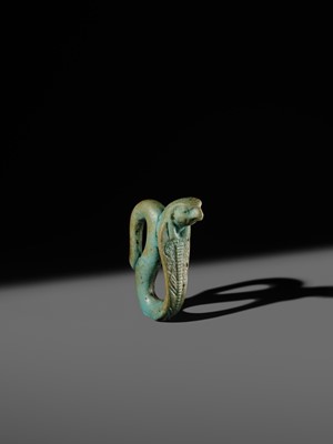 Lot 47 - A RARE URAEUS AMULET OF WADJET AND NEKHBET, TURQUOISE-BLUE FAIENCE, LATE PERIOD