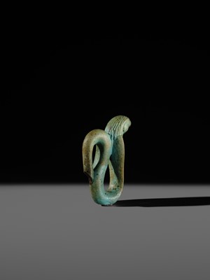 Lot 47 - A RARE URAEUS AMULET OF WADJET AND NEKHBET, TURQUOISE-BLUE FAIENCE, LATE PERIOD