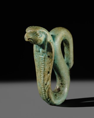 Lot 47 - A RARE URAEUS AMULET OF WADJET AND NEKHBET, TURQUOISE-BLUE FAIENCE, LATE PERIOD
