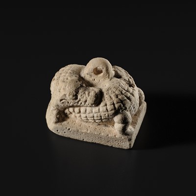 Lot 44 - A WHITE LIMESTONE AMULET OF SOBEK, PTOLEMAIC PERIOD