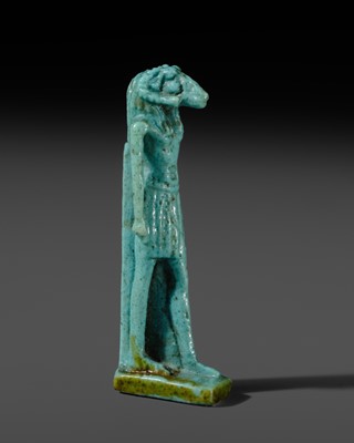 Lot 48 - A TURQUOISE-GLAZED FAIENCE AMULET OF KHNUM, THIRD INTERMEDIATE TO LATE PERIOD
