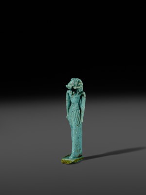 Lot 48 - A TURQUOISE-GLAZED FAIENCE AMULET OF KHNUM, THIRD INTERMEDIATE TO LATE PERIOD