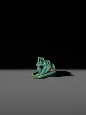 Lot 53 - A FINE ‘ANUBIS’ AMULET, TURQUOISE-COLORED FAIENCE, LATE PERIOD