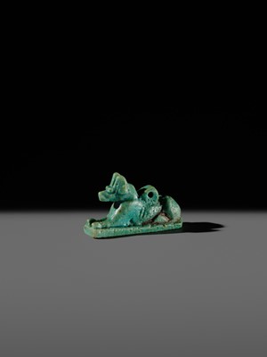 Lot 53 - A FINE ‘ANUBIS’ AMULET, TURQUOISE-COLORED FAIENCE, LATE PERIOD