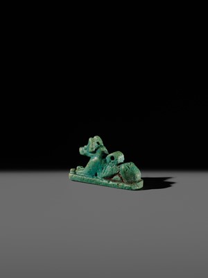 Lot 53 - A FINE ‘ANUBIS’ AMULET, TURQUOISE-COLORED FAIENCE, LATE PERIOD