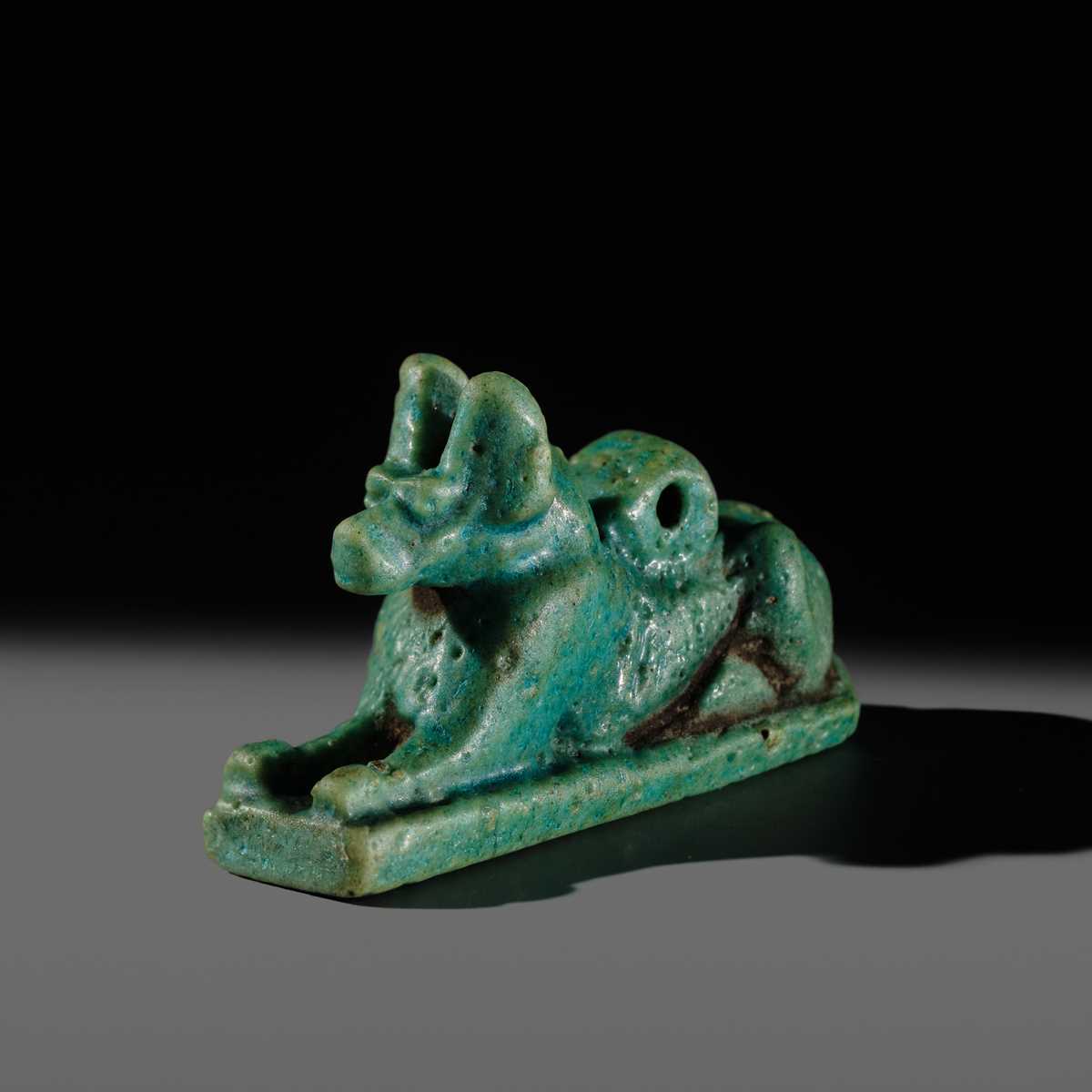 Lot 53 - A FINE ‘ANUBIS’ AMULET, TURQUOISE-COLORED FAIENCE, LATE PERIOD