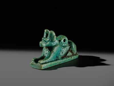 Lot 53 - A FINE ‘ANUBIS’ AMULET, TURQUOISE-COLORED FAIENCE, LATE PERIOD