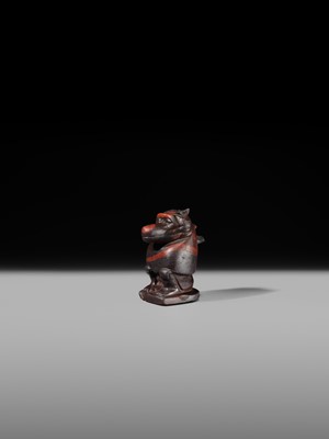 Lot 41 - AN EXCEPTIONAL RED JASPER AMULET OF A BABOON, LATE TO PTOLEMAIC PERIOD