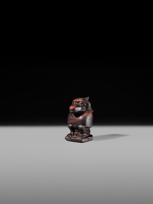 Lot 41 - AN EXCEPTIONAL RED JASPER AMULET OF A BABOON, LATE TO PTOLEMAIC PERIOD