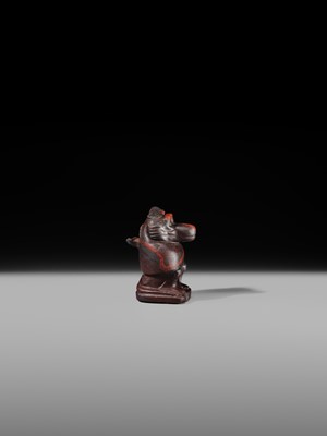 Lot 41 - AN EXCEPTIONAL RED JASPER AMULET OF A BABOON, LATE TO PTOLEMAIC PERIOD