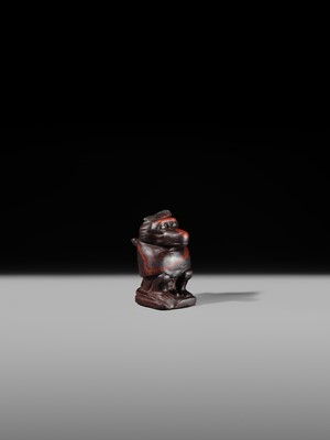 Lot 41 - AN EXCEPTIONAL RED JASPER AMULET OF A BABOON, LATE TO PTOLEMAIC PERIOD