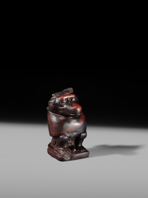 Lot 41 - AN EXCEPTIONAL RED JASPER AMULET OF A BABOON, LATE TO PTOLEMAIC PERIOD