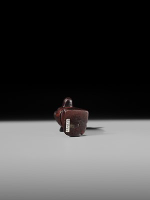 Lot 41 - AN EXCEPTIONAL RED JASPER AMULET OF A BABOON, LATE TO PTOLEMAIC PERIOD