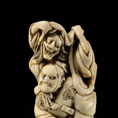 Lot 107 - A GOOD IVORY NETSUKE OF OMORI HIKOSHICHI ENCOUNTERING THE DEMONESS