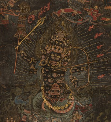 Lot 45 - A BLACK-GROUND THANGKA DEPICTING RAHULA, TIBET, 18TH TO EARLY 19TH CENTURY