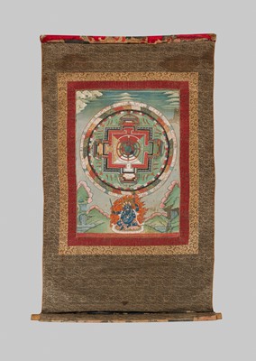 Lot 44 - A FINE THANGKA OF A MANDALA WITH CHATURBHUJA MAHAKALA, 18TH-19TH CENTURY