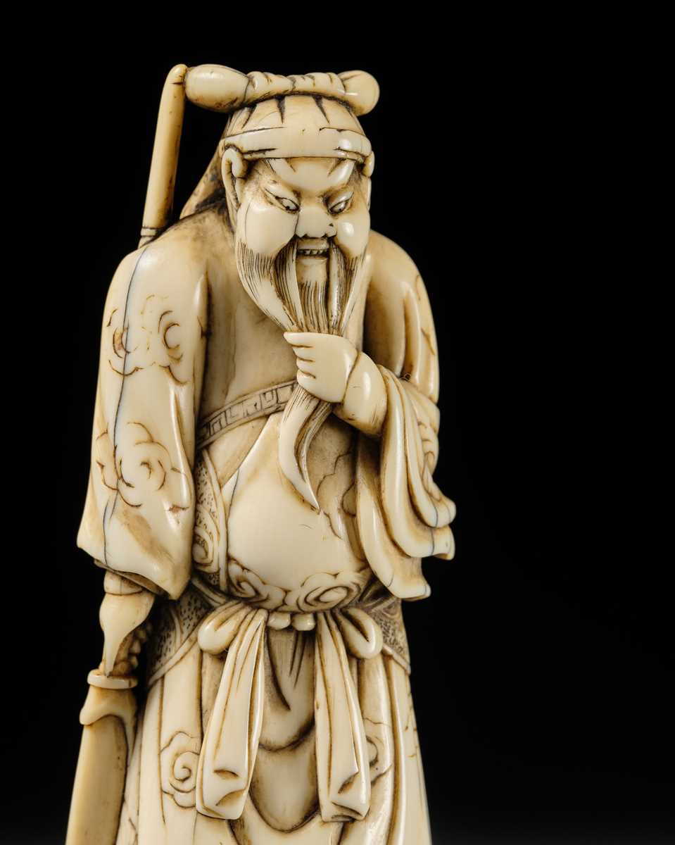Lot 106 - A LARGE AND SUPERB IVORY NETSUKE OF KAN’U