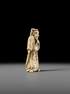 Lot 106 - A LARGE AND SUPERB IVORY NETSUKE OF KAN’U