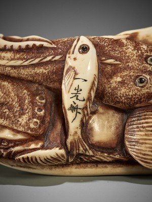 IKKOSAI: A FINE IVORY NETSUKE OF MARINE LIFE
