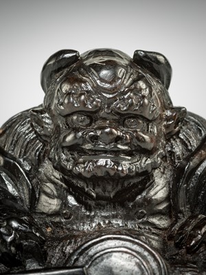 Lot 594 - SEISAI: A POWERFUL DARK WOOD NETSUKE OF ONI