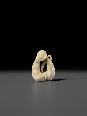 Lot 136 - AN IVORY NETSUKE OF EDAMAME BEAN PODS