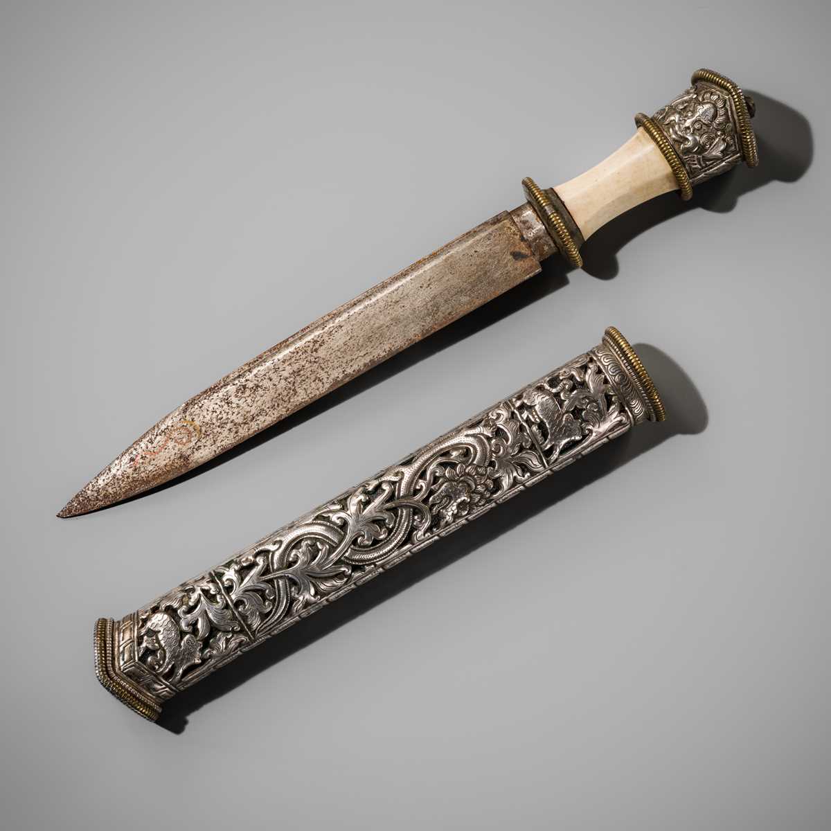 Lot 31 - A BONE AND SILVER-MOUNTED CEREMONIAL DAGGER, DUGHTI, LATE 19TH-EARLY 20TH CENTURY
