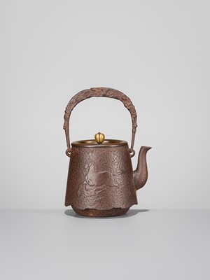 Lot 34 - SEISUKE: AN IRON TETSUBIN (TEA KETTLE) WITH GALLOPING HORSE