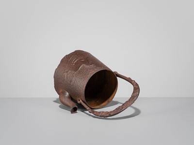 Lot 34 - SEISUKE: AN IRON TETSUBIN (TEA KETTLE) WITH GALLOPING HORSE