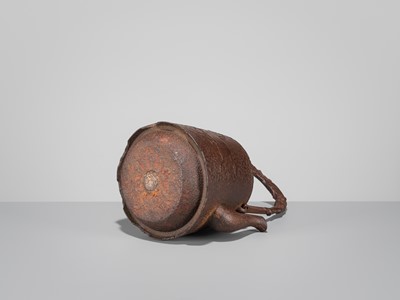 Lot 34 - SEISUKE: AN IRON TETSUBIN (TEA KETTLE) WITH GALLOPING HORSE