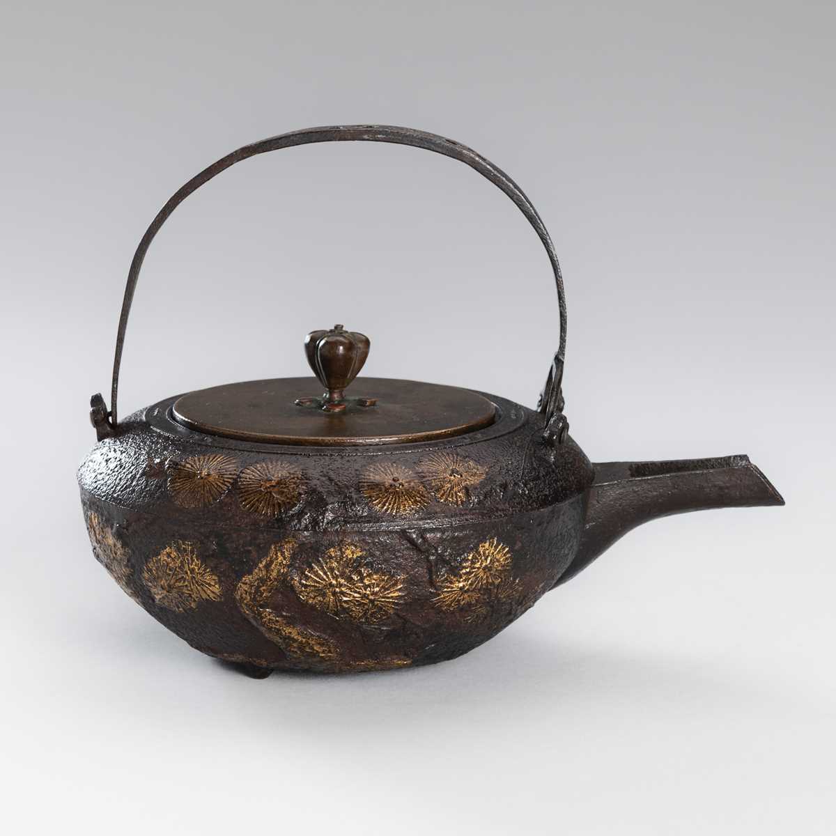 Lot 1 - A SILVER-INLAID IRON TETSUBIN (TEA KETTLE) WITH PINE BRANCHES