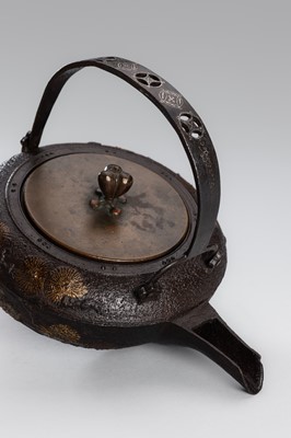 Lot 1 - A SILVER-INLAID IRON TETSUBIN (TEA KETTLE) WITH PINE BRANCHES