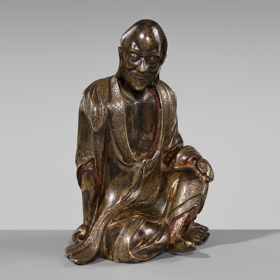 Lot 55 - A RARE BRONZE FIGURE OF A LUOHAN, YUAN-MING DYNASTY