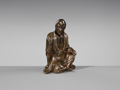 Lot 55 - A RARE BRONZE FIGURE OF A LUOHAN, YUAN-MING DYNASTY
