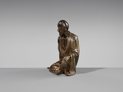 Lot 55 - A RARE BRONZE FIGURE OF A LUOHAN, YUAN-MING DYNASTY